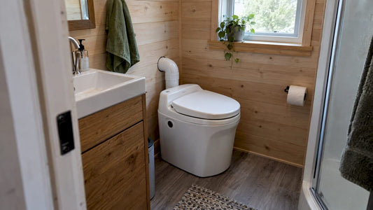 Composting toilet installed in tiny bathroom